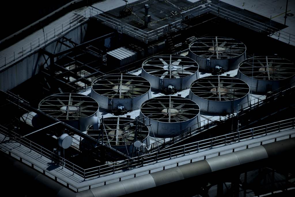 Aerial view of rooftop cooling tower fans